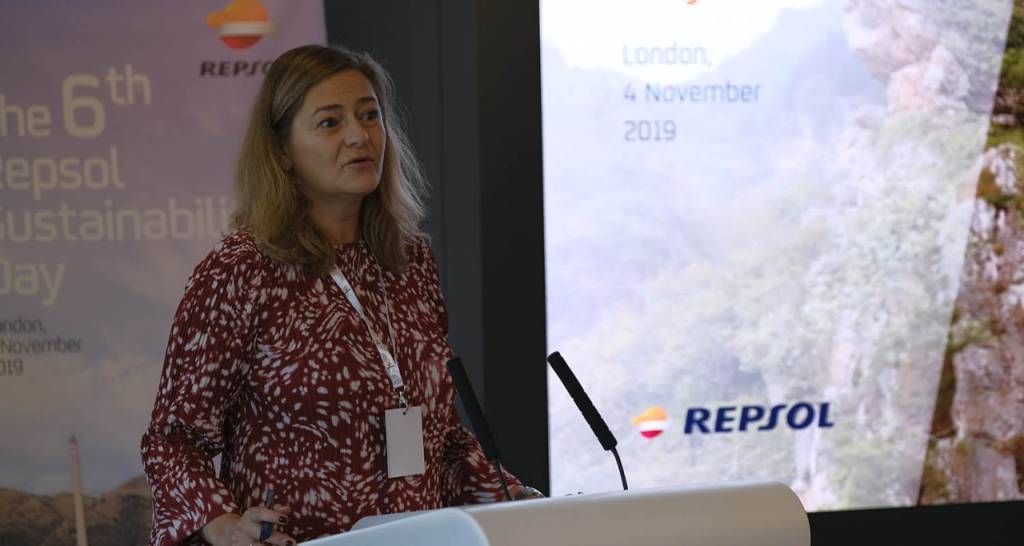 Woman speaking at a lectern