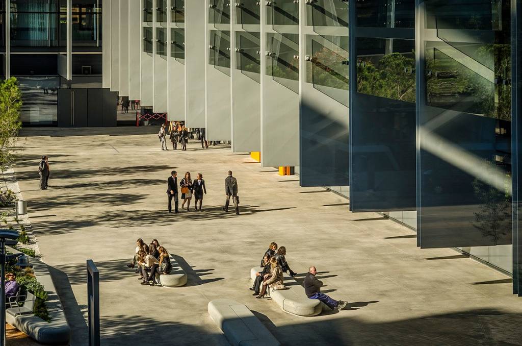 Employees walking around the Repsol Campus