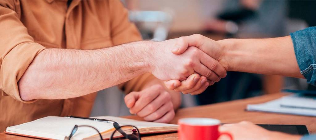 Close-up of a handshake