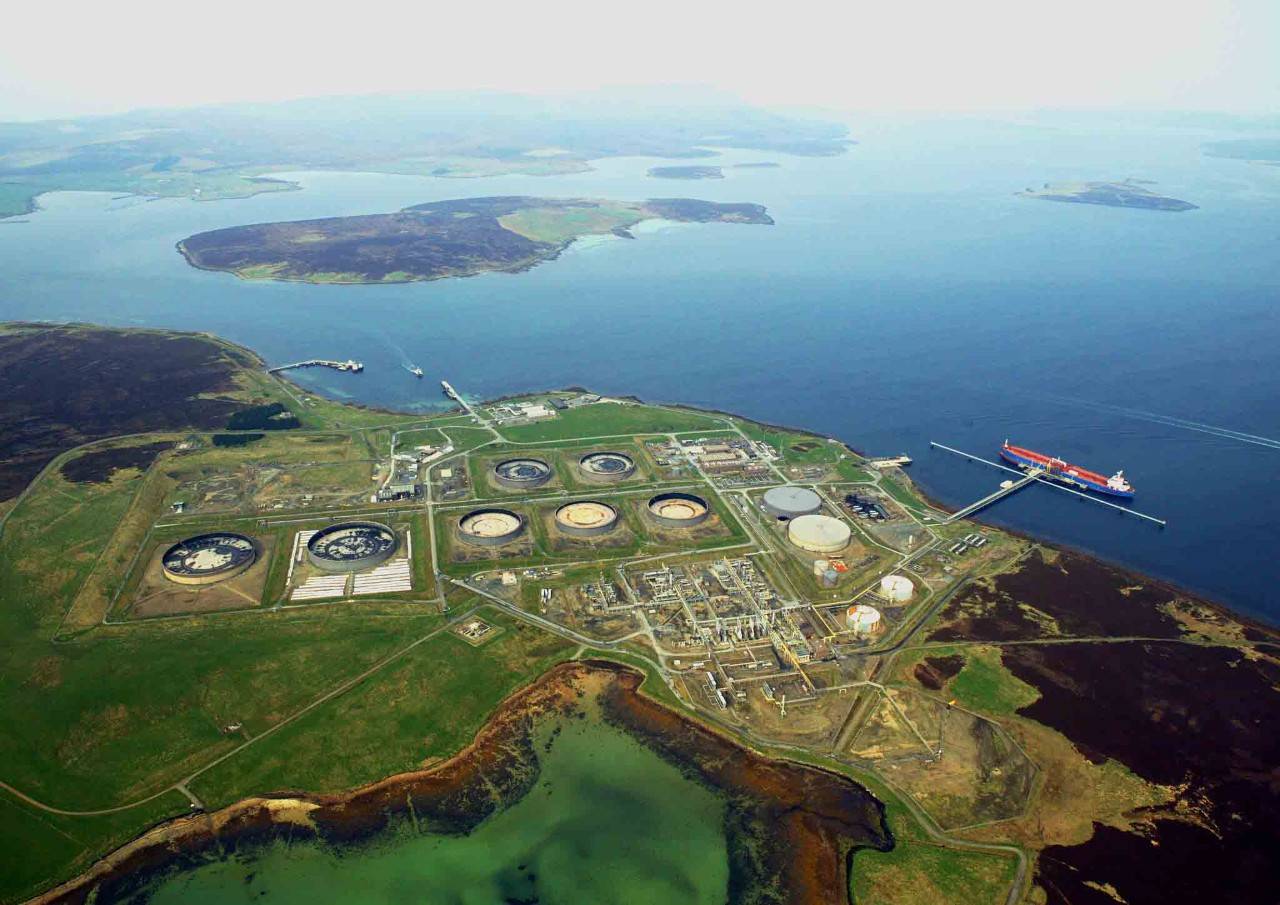 Aerial view of an oil facility along the coast