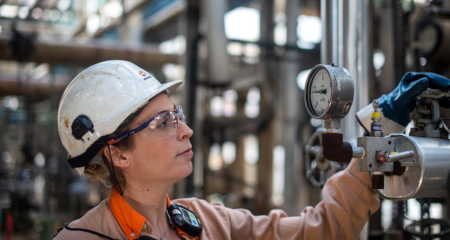 Female operator working on a machine