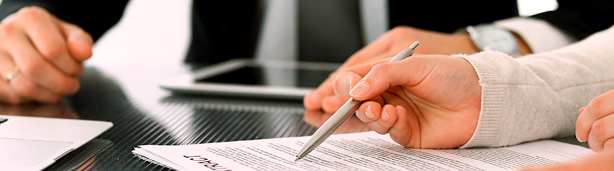 Two people looking at documents